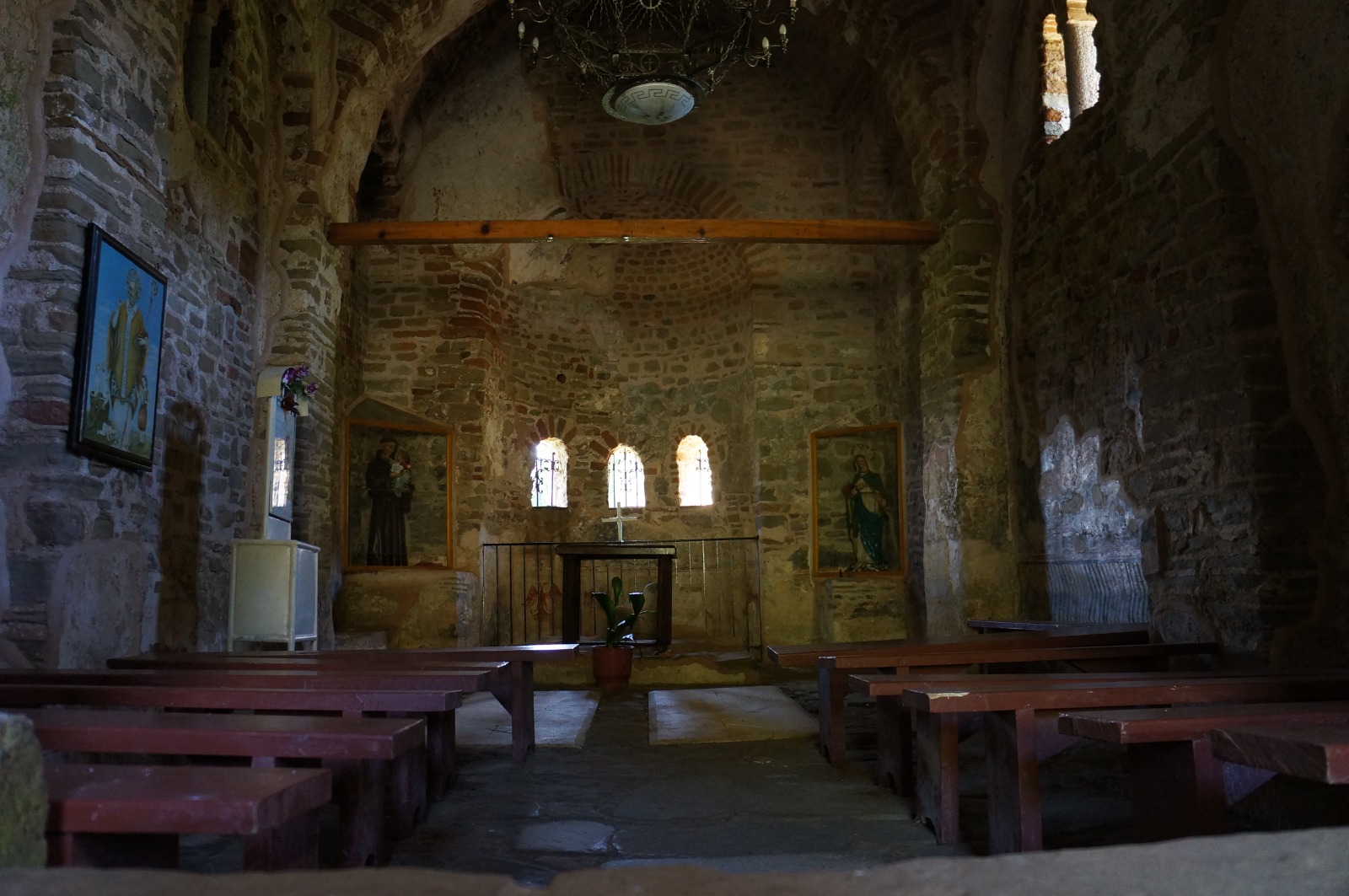 Interior of the historic church with pews and altar