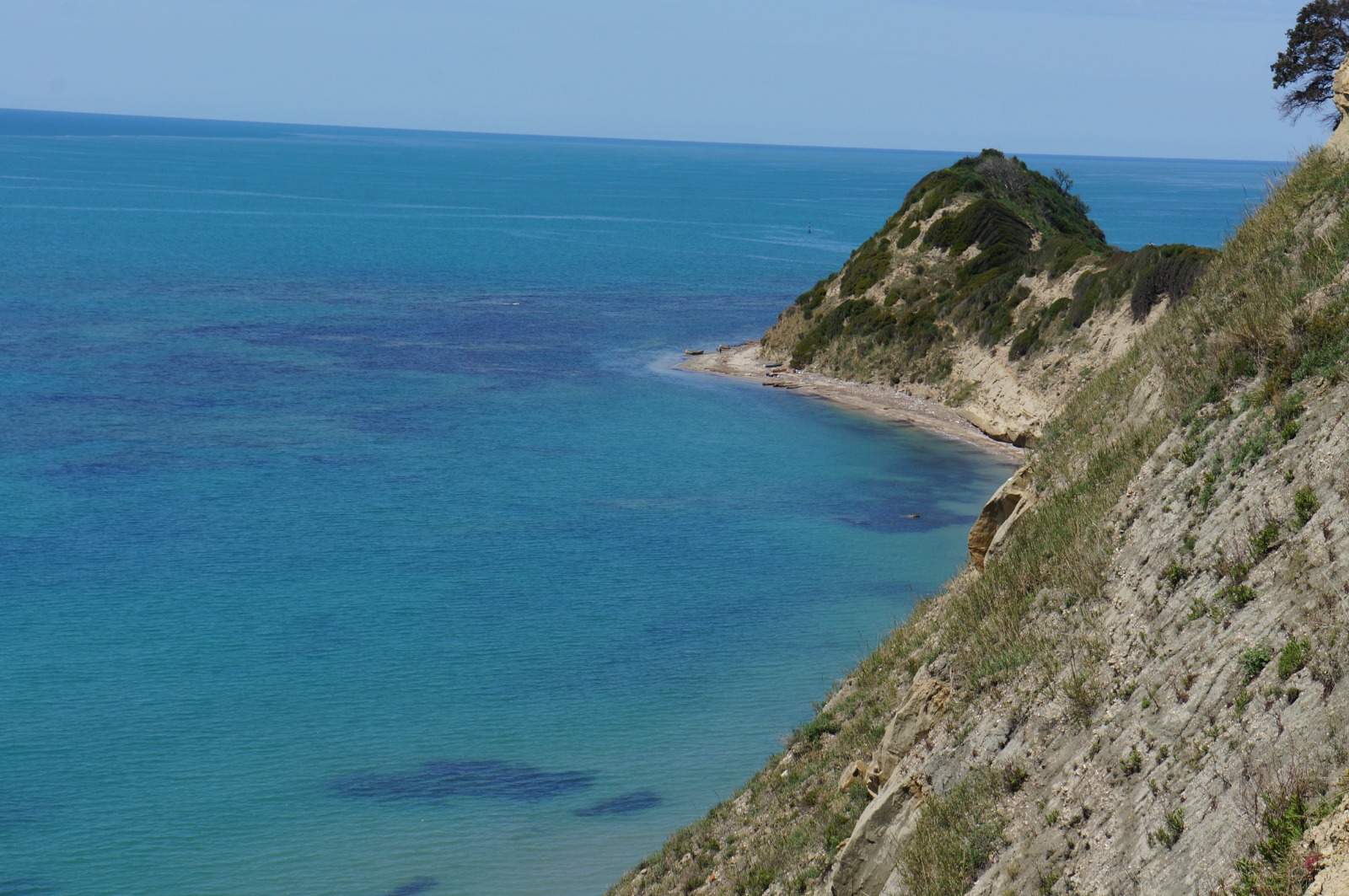 Turquoise Albanian coastline with cliffs